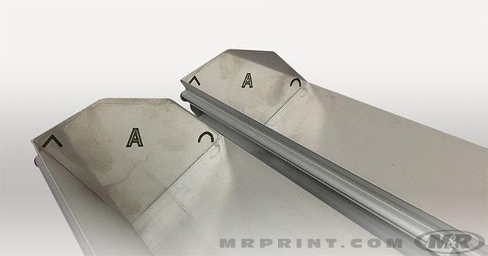 Dual-edge design allows for greater range of coating thicknesses while laser etched markings illustrate round edge, or sharp edge coating profile.